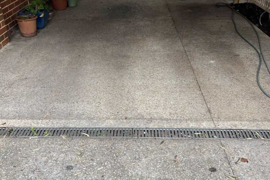Exposed aggregate cleaning: before